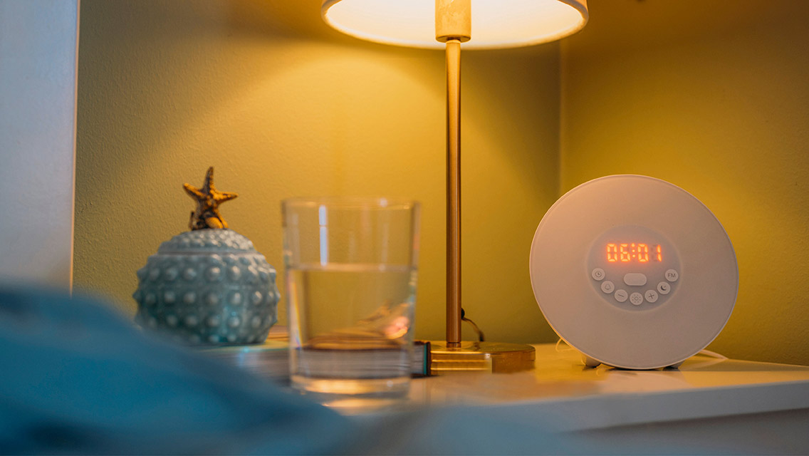 a neatly arranged bedside table