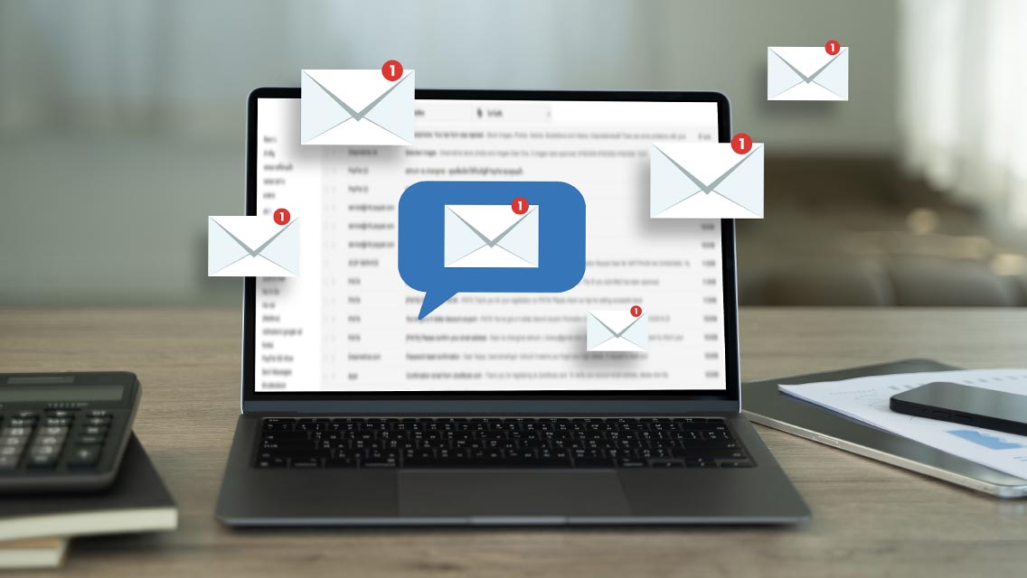 a computer screen with email icons floating around it.