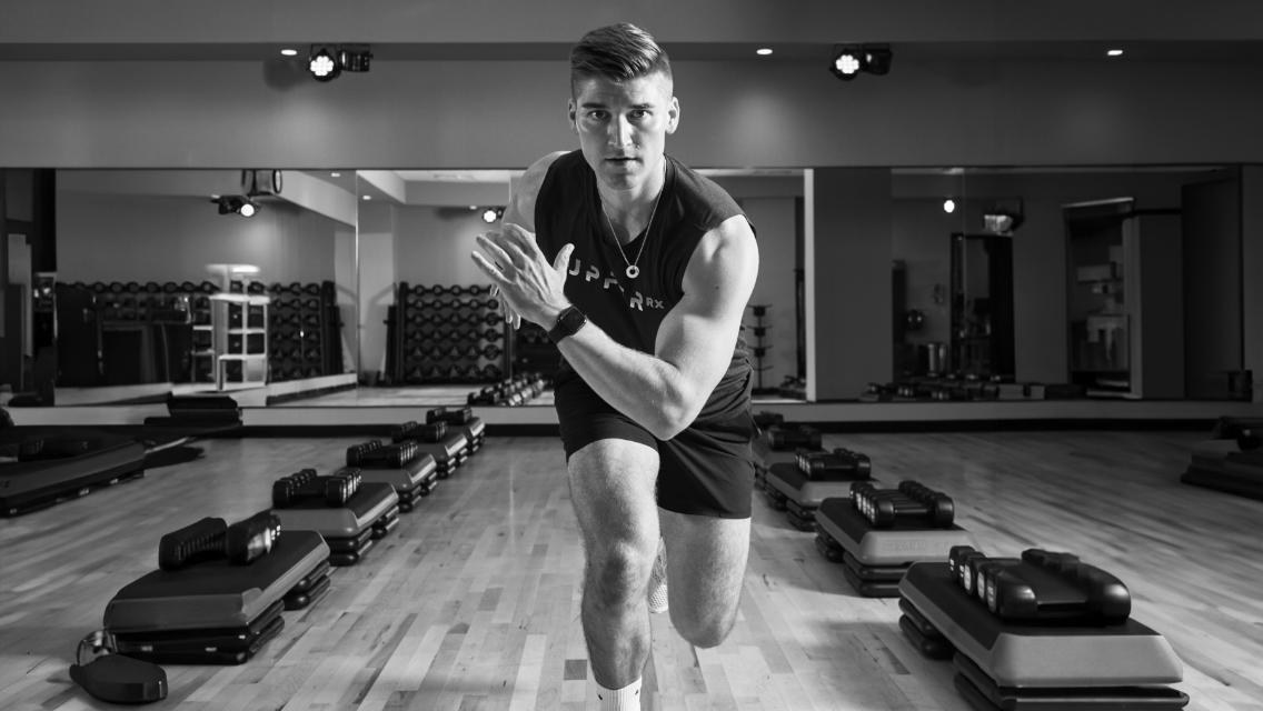 Austin lunging in a studio