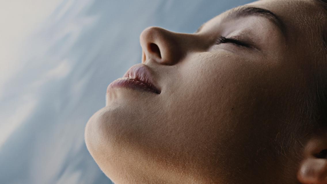 Face tilted up toward sunlight