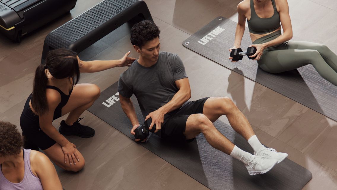 person doing workout on mat