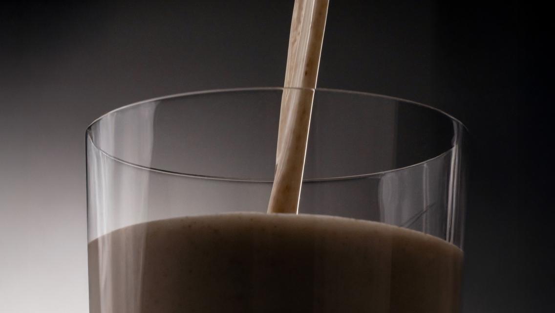 protein shake poured in glass