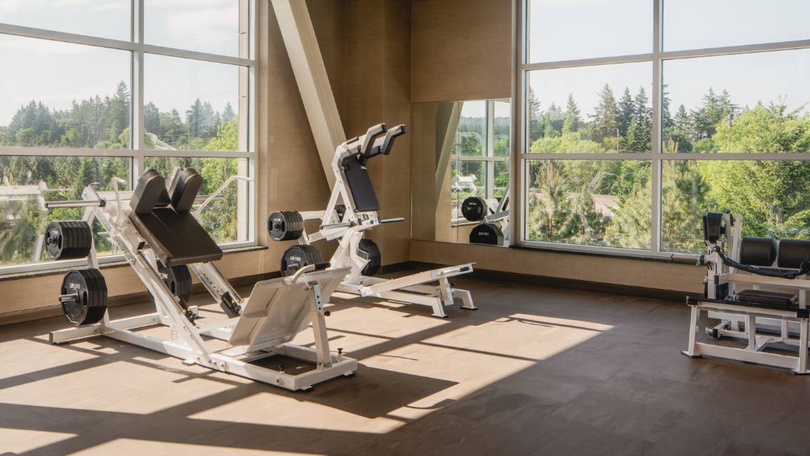 Strength machines on the workout floor at Life Time