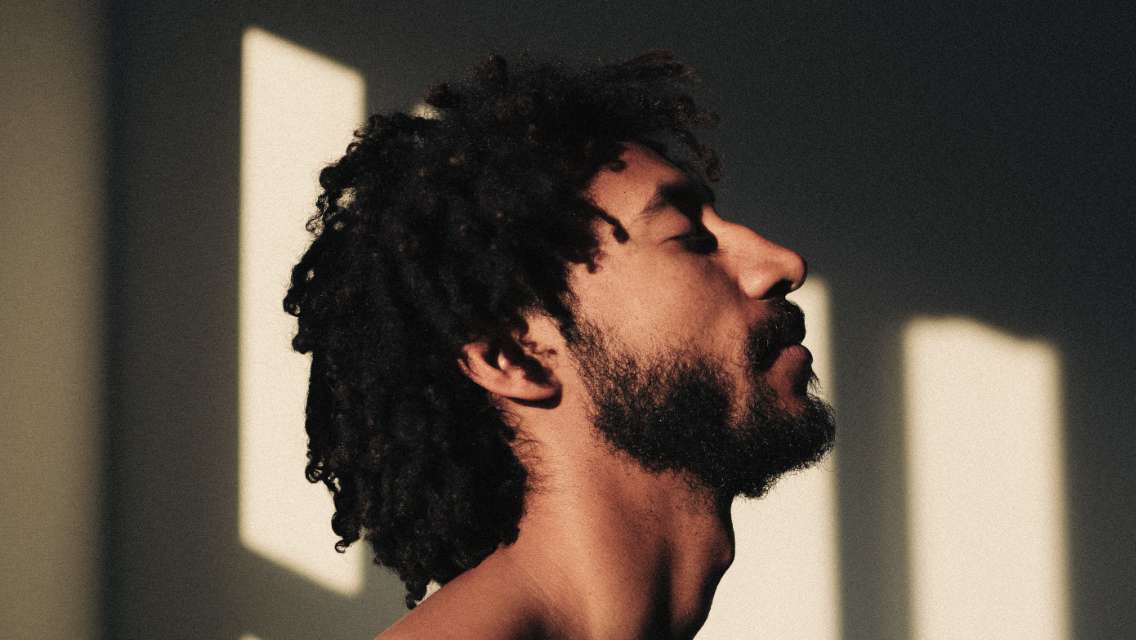 man with eyes closed