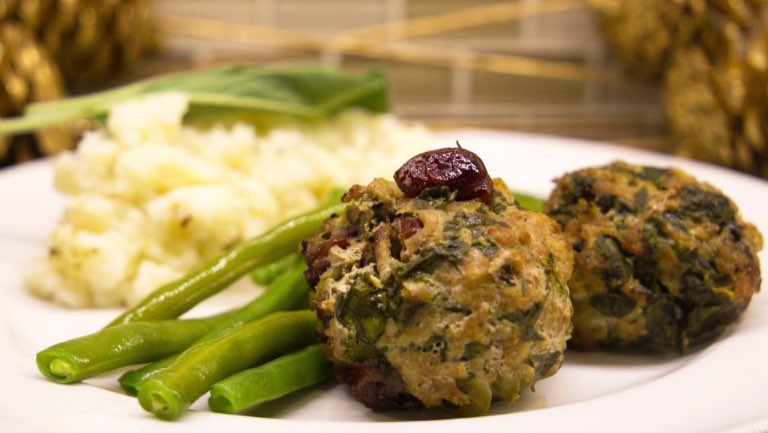 A plate of cran-apple turkey meatballs, veggies, and potatoes.