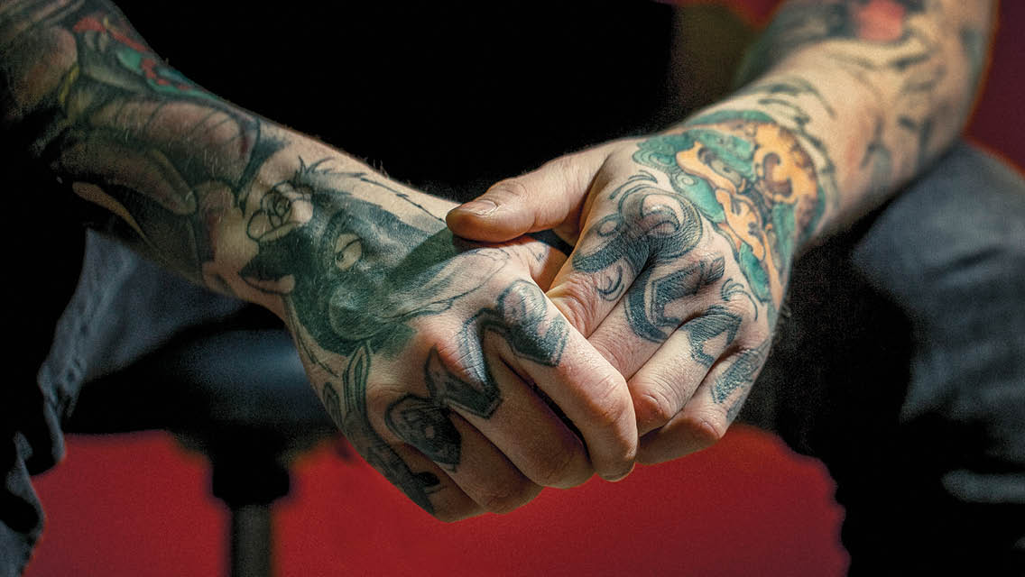 tattooed hands