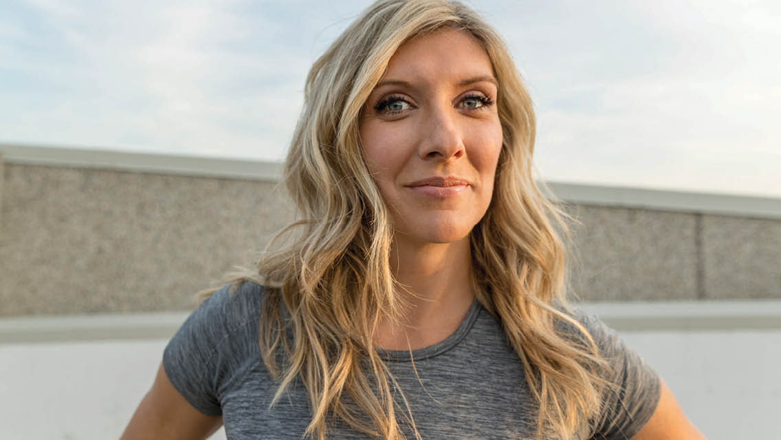 headshot of Jamie Martin, editor in chief of Experience Life magazine