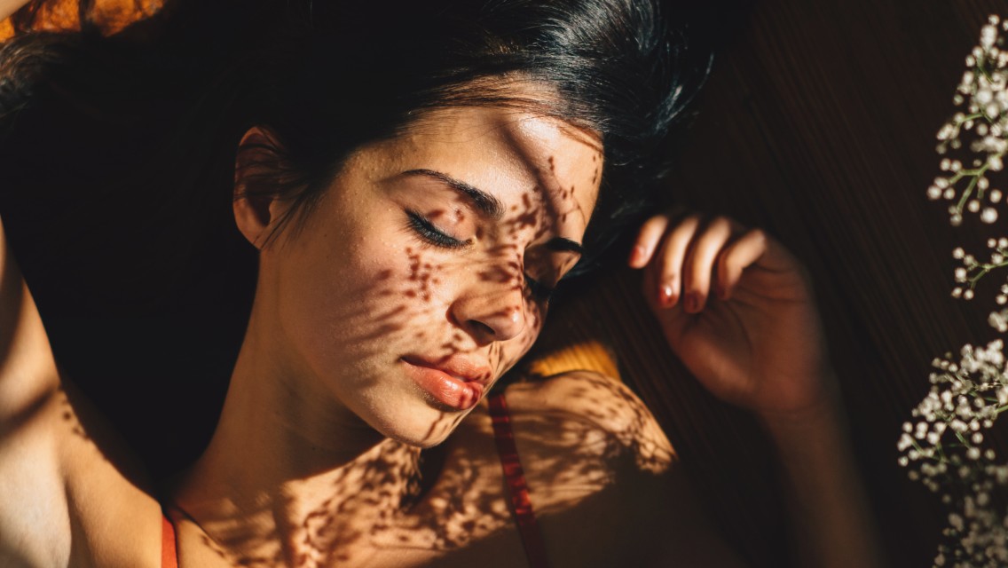 woman with shadows on her face