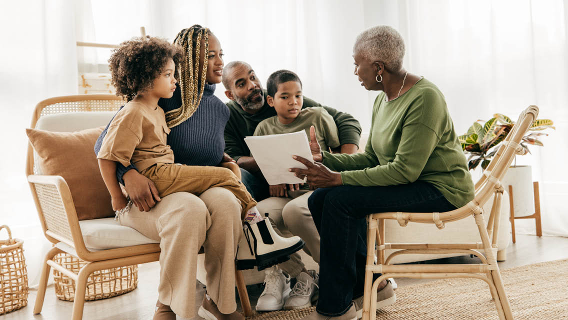 a woman meets with her family to share her recent medical diagnosis