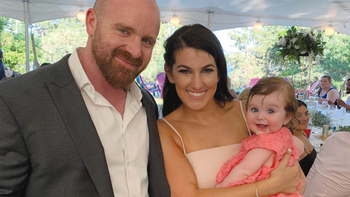 Cliff Edberg with his wife and daughter