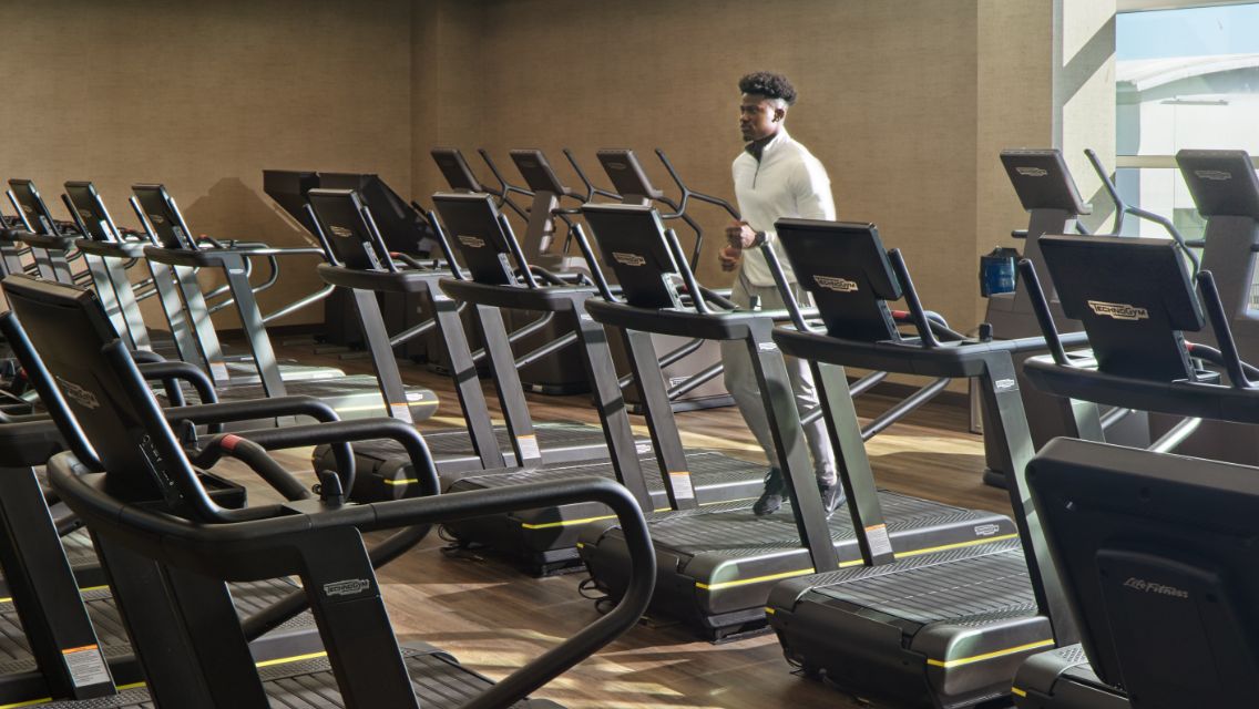 man running on treadmill