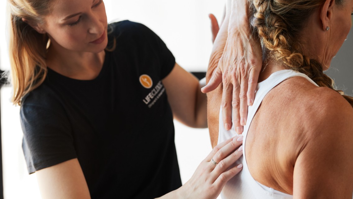 LifeClinic chiropractor doing a spinal adjustment for a patient