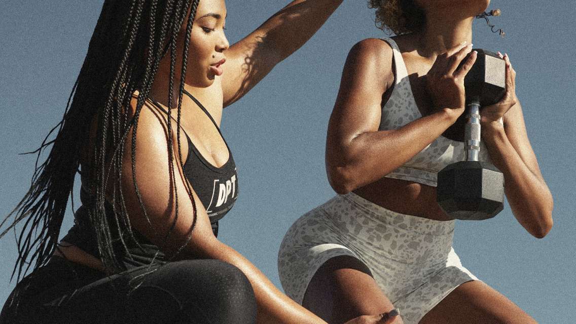 A Dynamic Personal Trainer working with a client