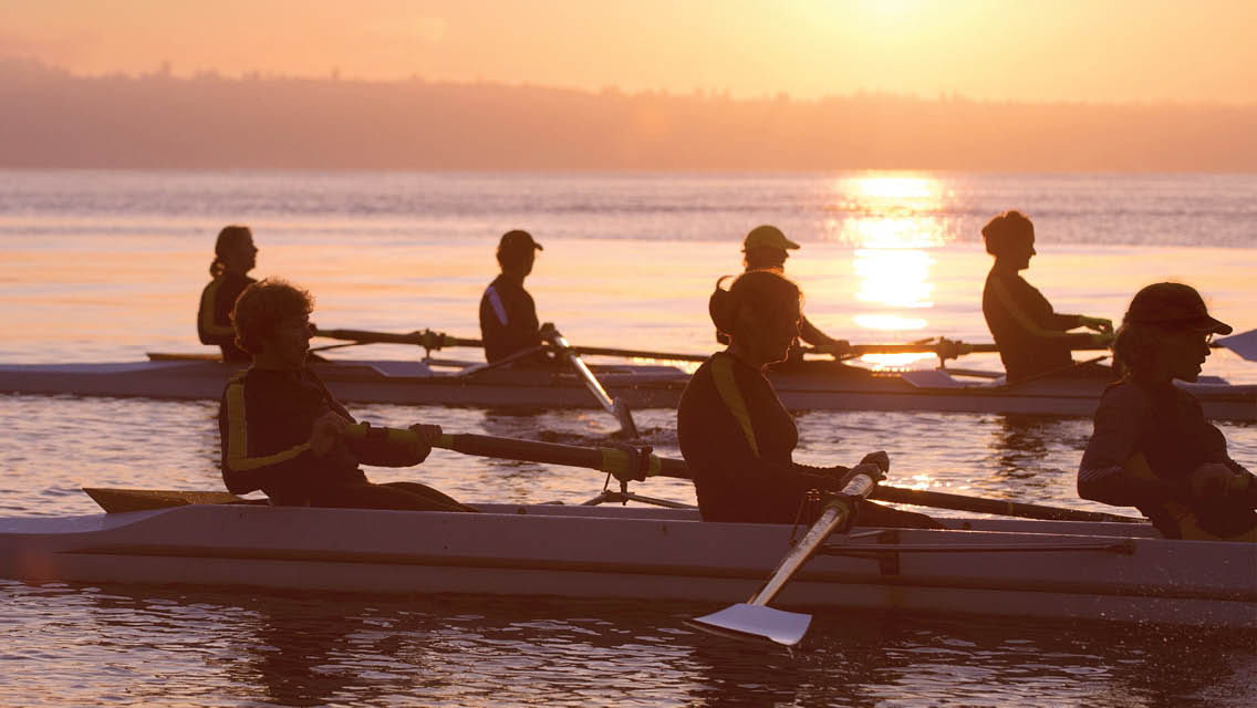 rowers at sunrise