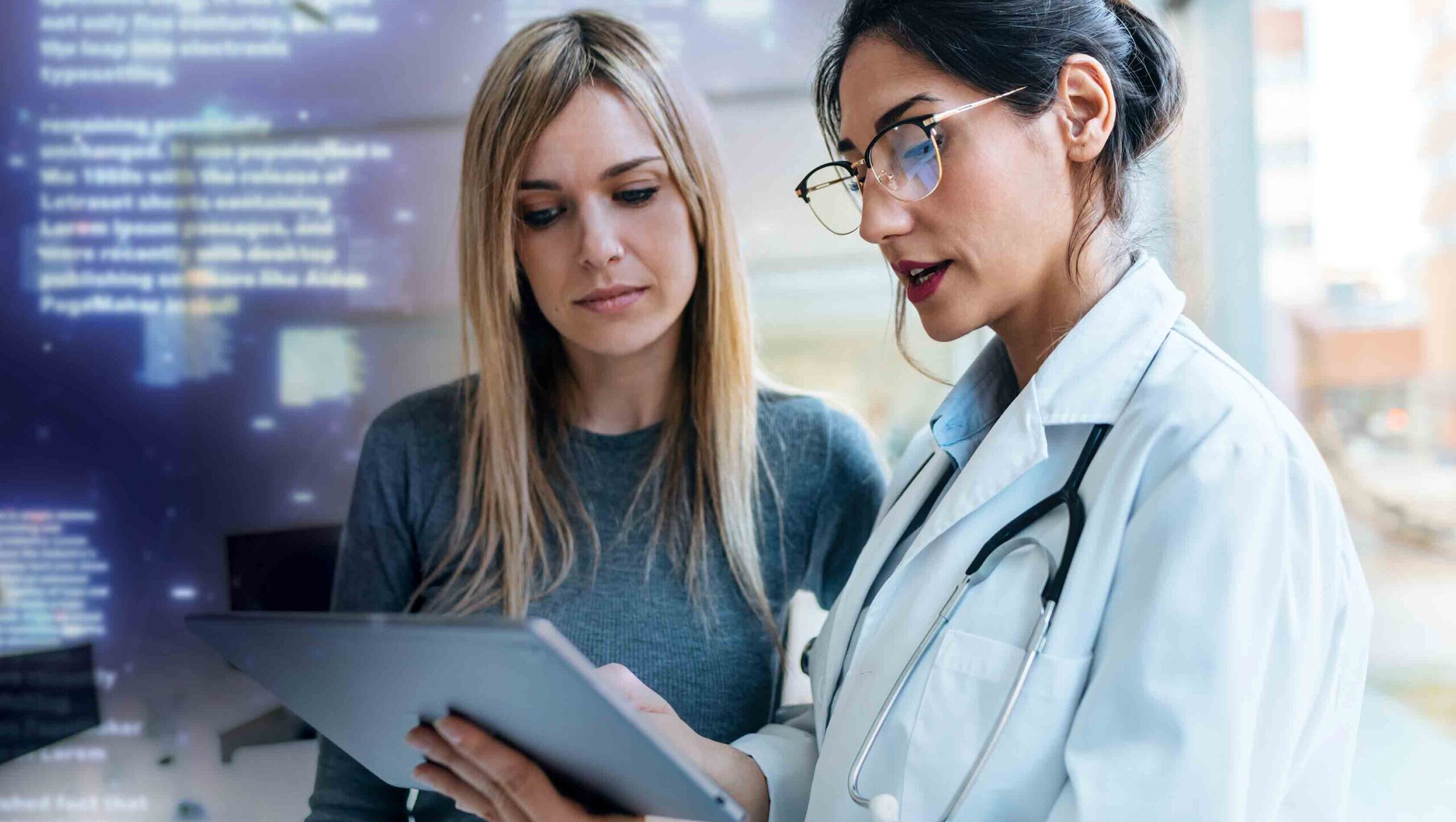 a doctor reviews exam notes with a patient