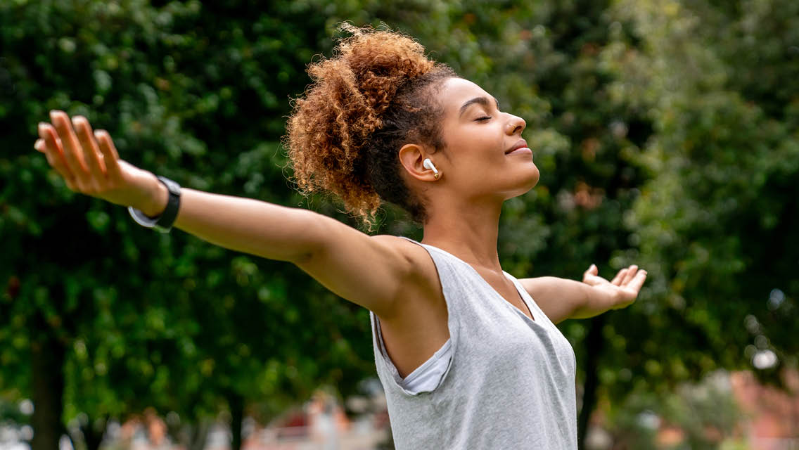 a woman with out stretched arms