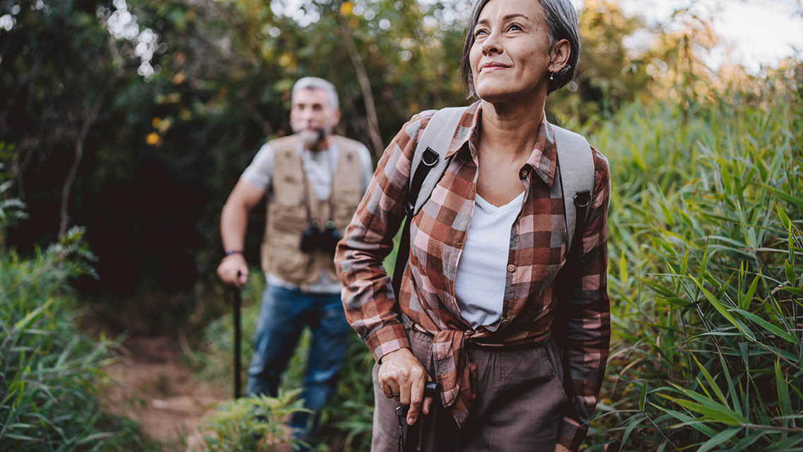 a senior couple hiking