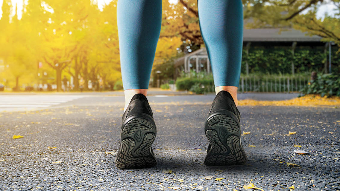 person standing on toes